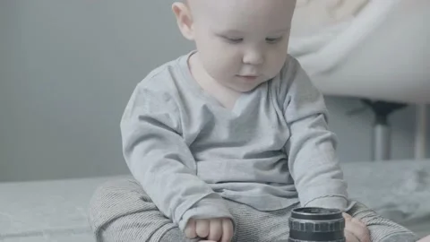 Little baby playing  camera Stock Footage 131301447