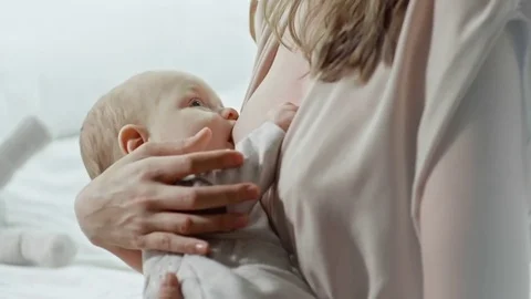Little Baby Sucking Mothers Breast | Stock Video 