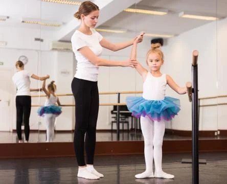 Little ballerina practicing choreographic elements Stock Photos