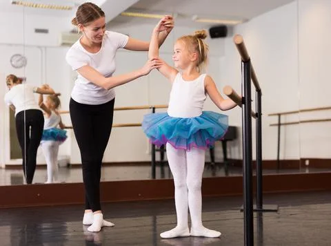 Little ballerina practicing choreographic elements Stockfoto's