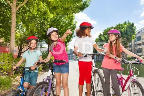 Little bike riders searching for right direction Stock Photos