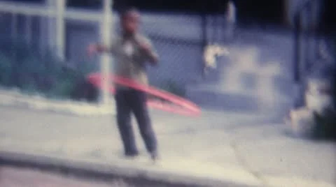 Little Black Boy doing Hula Hoop 16mm Super8 Video stock 11146583