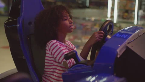 Little black boy using the steering wheel Stock Footage 283276319