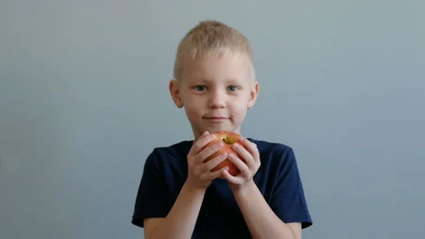 Boy Eating Apple Stock Video Footage | Royalty Free Boy Eating Apple ...