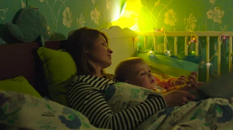 Little Book Reader Doesn't Want to Sleep Stock Footage 56721857