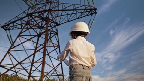 Little boy acting role of engineer or manager with safety helmet. Occupation in Stock Footage 294786097