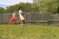 Little boy and woman in costume at farm Footage