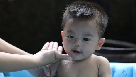 Little boy in bath with foam Stock Footage 79311318