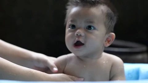 Little boy in bath with foam Stock Footage 79311327