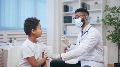 Little boy being afraid of injections at doctor's office, childhood immunization Stock Footage 201145767