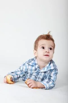 Little boy with bread Stock Photos