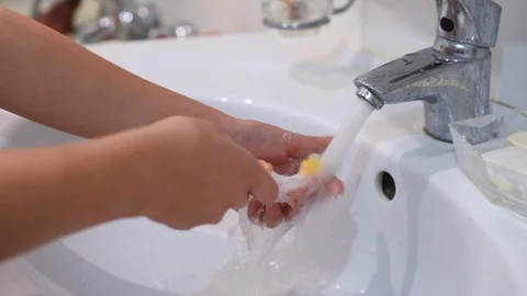 Little boy brushing his teeth in the bathroom Stock Footage 122106893