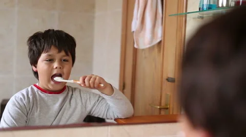 Little boy brushing teeth Stock Footage 46317315