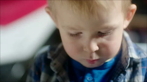 Little Boy Busy Doing Puzzle Stock Footage 62219649