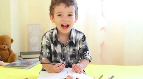 Little boy coloring Stock Footage 40401614