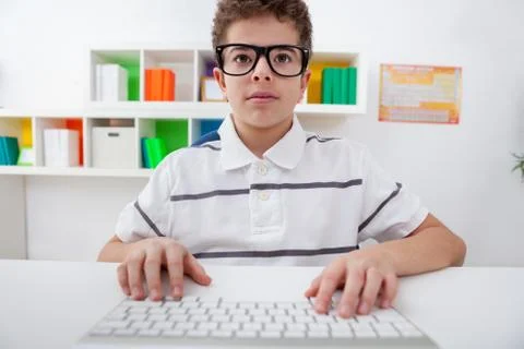 Little boy with computer keyboard, Stock Photos
