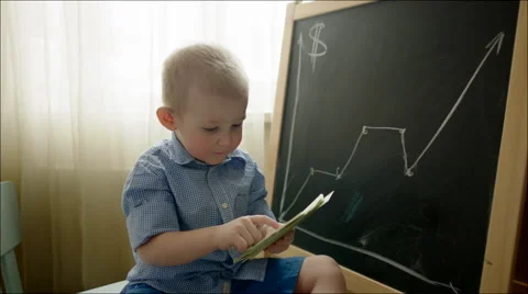Little Boy Counting Dollar Notes Stock Footage 60404913