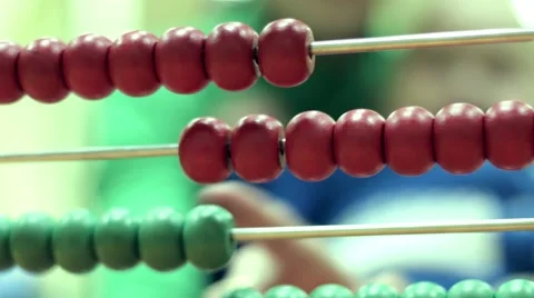 Little boy counts on abacus Stock Footage 57320261