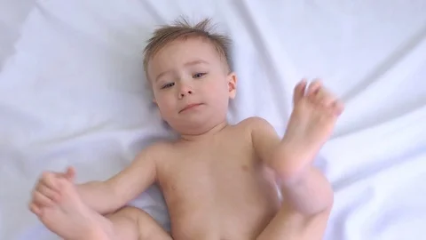 Little boy crying on a white background. Dependence on computer games Stock Footage 74722125