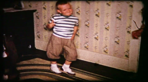 Little boy dancing at home for the family 1950s vintage film home movie 200 Stock Footage