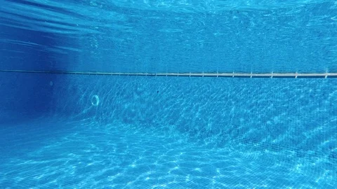 Little boy diving in a pool Stock Footage 119694230