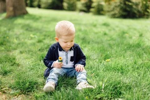 Little boy do bubbles with his mother at park Stock Photos