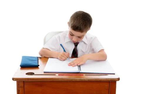 Little boy doing school work or homework Stock Photos