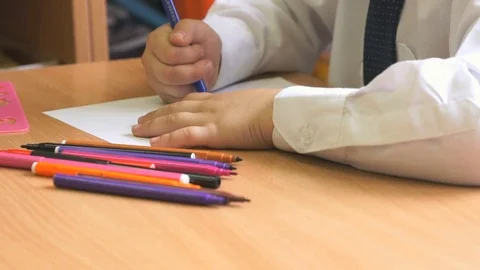 Little boy draws the image using the markers Stock Footage 71780055