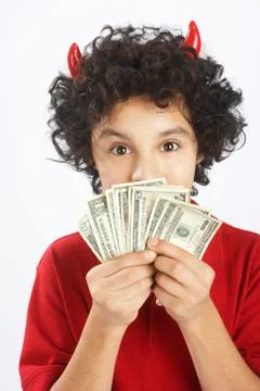 Little Boy Dressed as Devil Holding Cash 스톡 사진