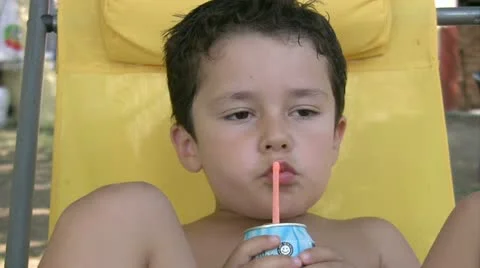 Little boy drinking  juice Stock Footage 11789912