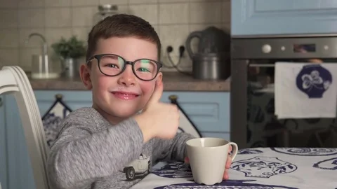 Little boy is drinking milk and showing thumbs up Stock Footage 81258859