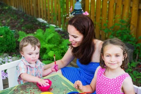 Little Boy Dyes his Easter Egg Stock Photos