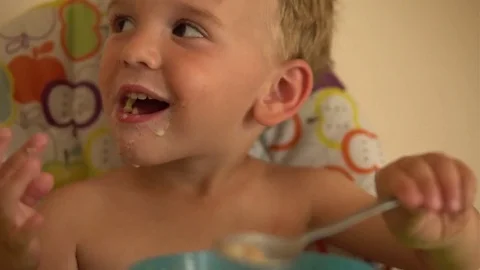 Little Boy Eating Cornflakes With Milk  Stock Footage 80238008