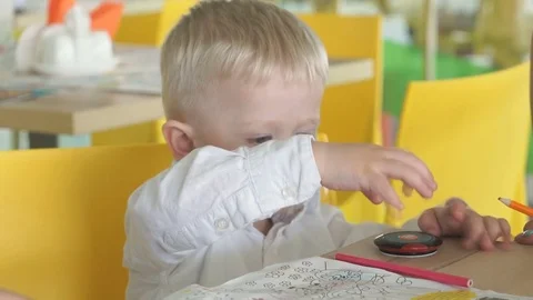 Little boy in an entertaining children's complex Stock Footage 80305689