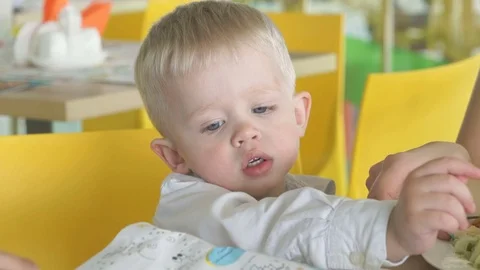 Little boy in an entertaining children's complex Stock Footage 80356947