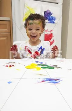 Little Boy Finger Painting
