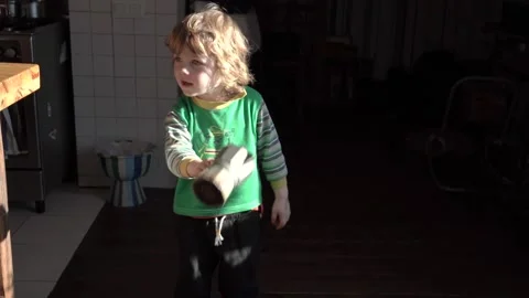A little boy is having fun in the kitchen Stock Footage 239604757