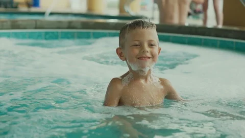 Little boy having fun in the pool Stock-Footage 123981190