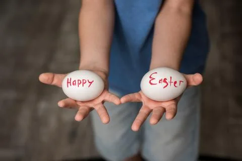 A little boy holding a Easter eggs Stock Photos