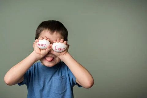 A little boy holding a Easter eggs Stock Photos