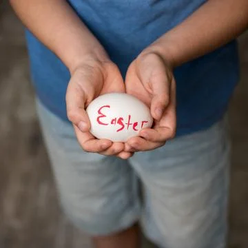 A little boy holding a Easter eggs Stock Photos
