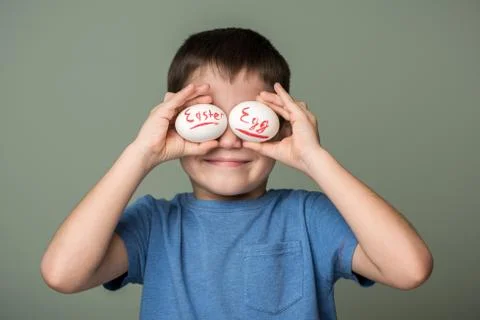A little boy holding a Easter eggs Stock Photos