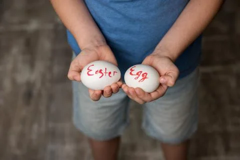 A little boy holding a Easter eggs Stock Photos