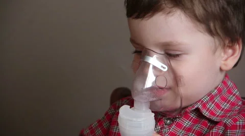 The Little Boy With an Inhaler Stock Footage 66252192