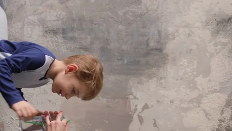 Little boy jumping on a bed Video stock 91822520