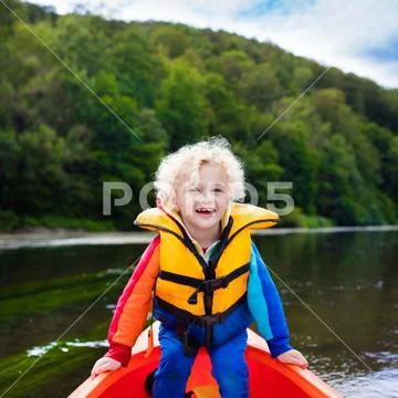 Little boy in kayak Stock Photos