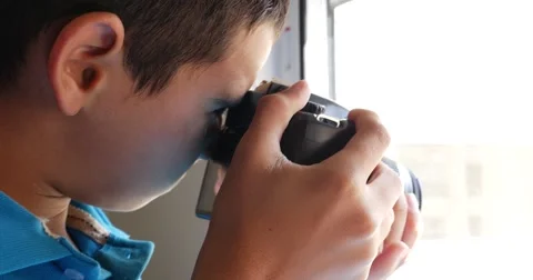 Little boy learning how taking picture Stock Footage 60038675