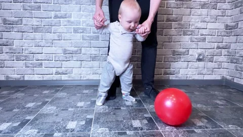 Little boy learning to walk o 動画素材 172360281