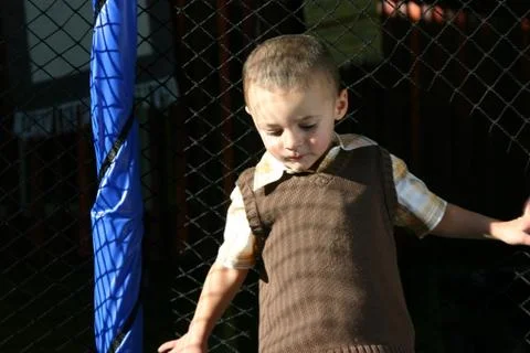 Little Boy Looking Down Stock Photos
