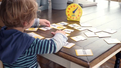 Little Boy Looking At Time Illustrations And Studying Clock Stock-Footage 129499362
